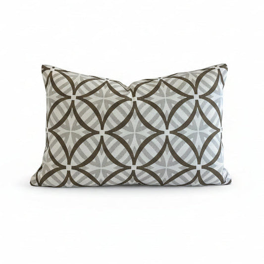 A rectangular lumbar cushion in a geometric outdoor fabric 