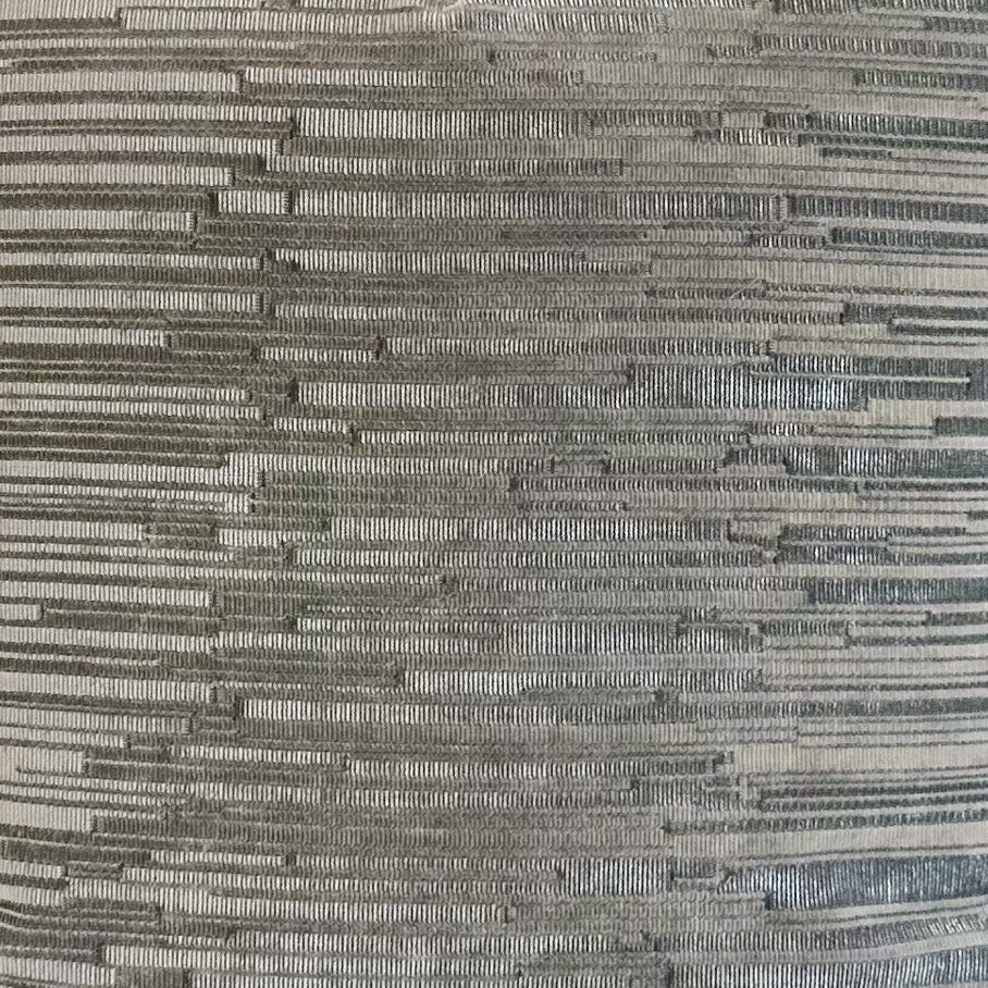 Closeup of textured and shiny silver fabric