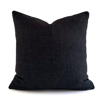 Back of quadrant cushion showing cushy colour raven on a white background