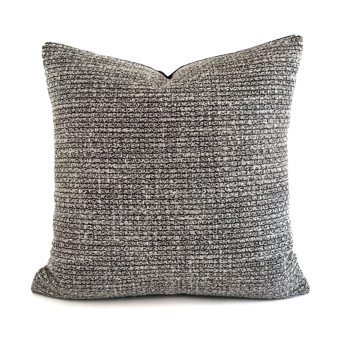 Textured quadrant cushion on a white background
