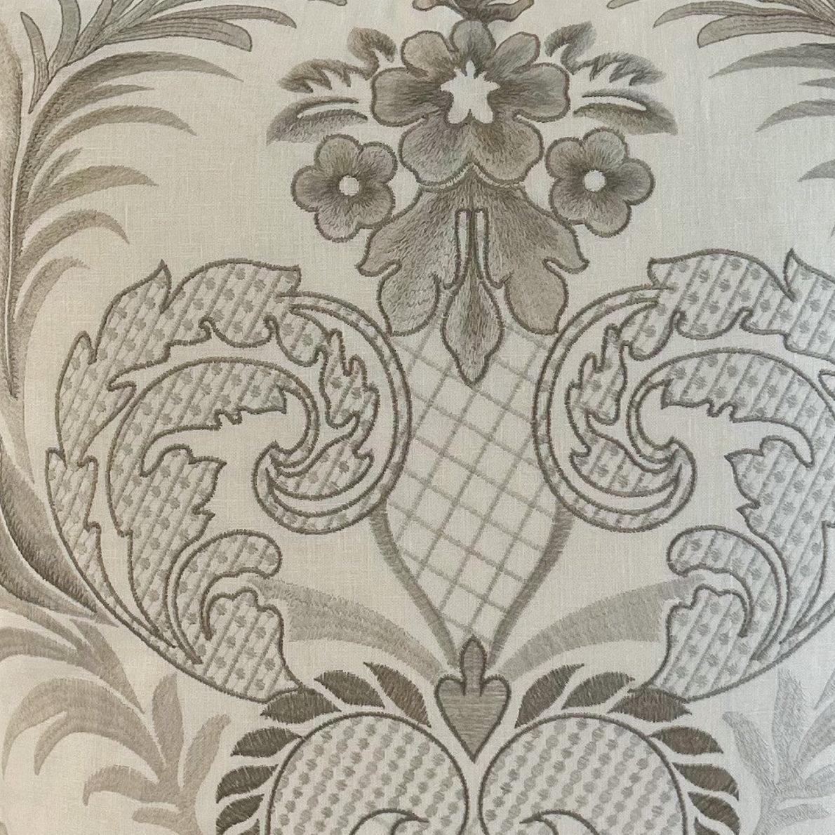 Decorative embroidered damask fabric 