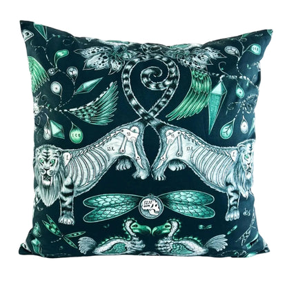 Decorative pillow with intricate design of two tigers, dragons, and geometric patterns on a white background.