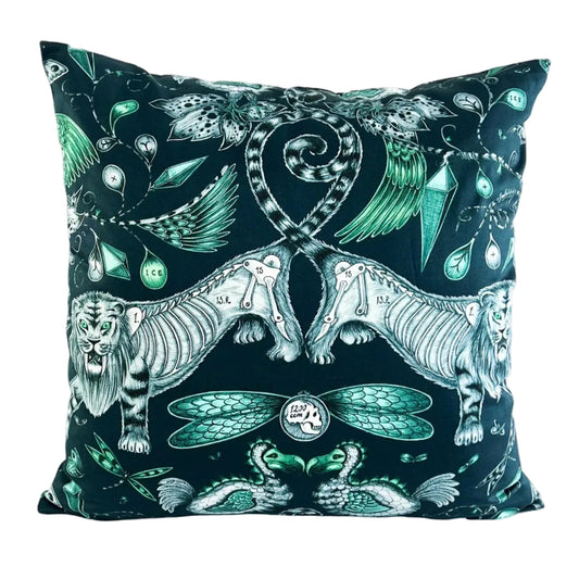 Decorative pillow with intricate design of two tigers, dragons, and geometric patterns on a white background.