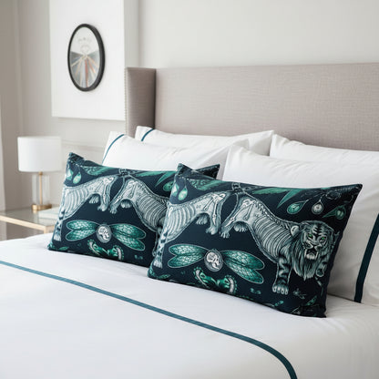Two decorative lumbar cushions with tiger and dragonfly design on white bedding  