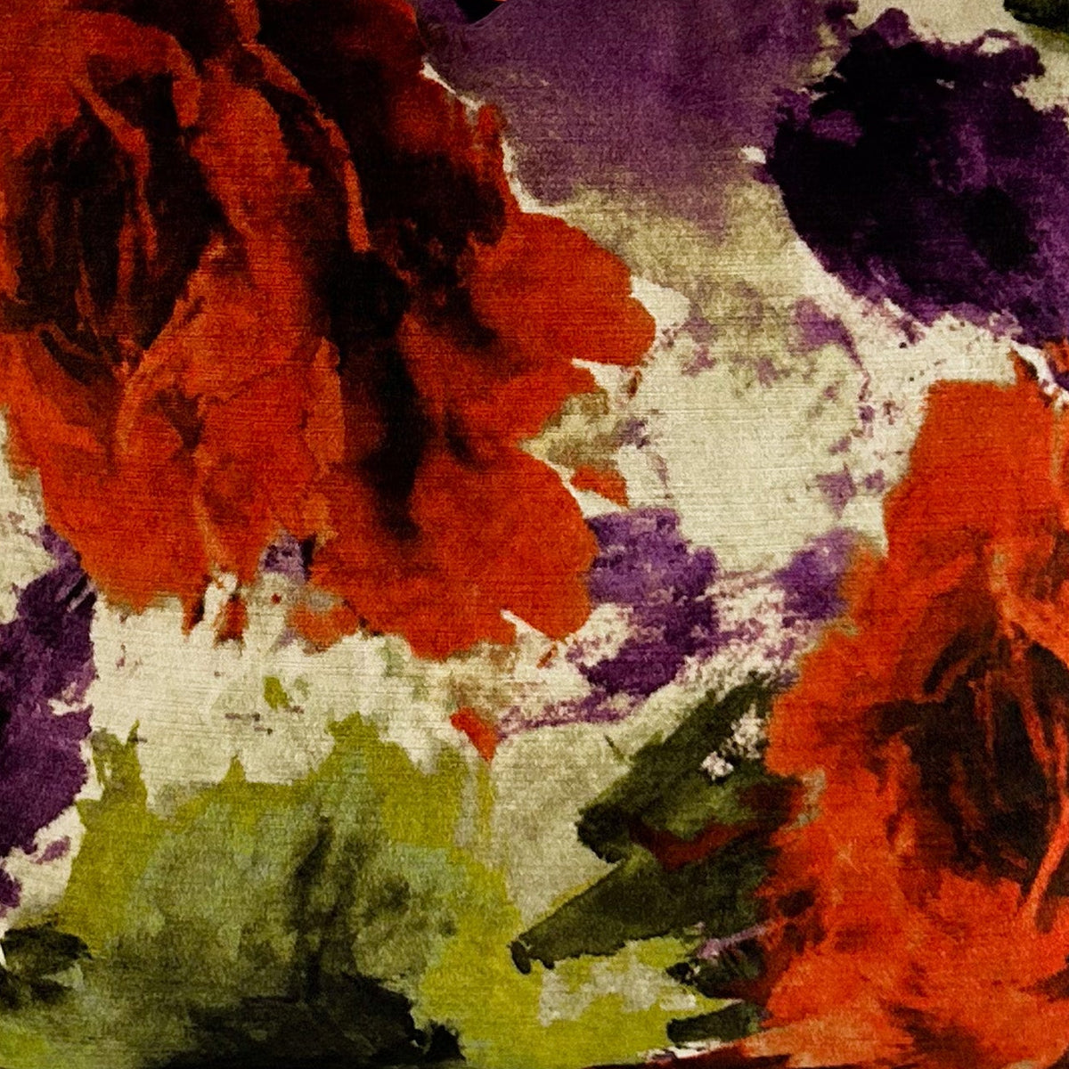 Floral patterned fabric with russet, purple, and green colours