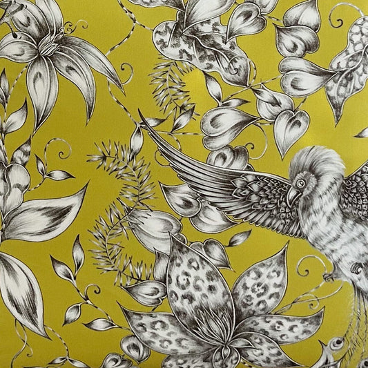 Decorative fabric with black and white bird and floral pattern on a Chartreuse colour background
