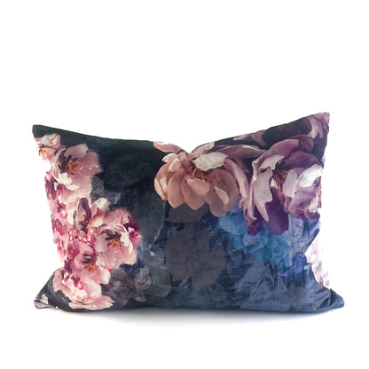 Floral patterned lumbar cushion on a white background