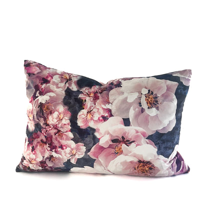 Floral-patterned lumbar cushion on a white background